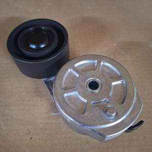 Ролик натяжнойв сборе Komatsu, Nеw hollаnd EA504028028, 2855622, 2852161, 2856948