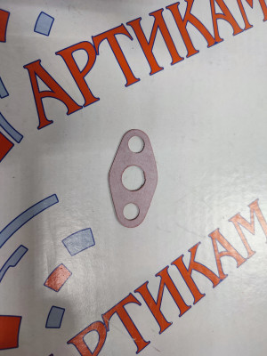 Прокладка трубки слива масла с турбокомпрессора (ISF2.8/3.8, 4ISBe) красная паронит